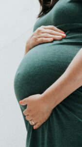 Pregnant Woman Holding Her Belly