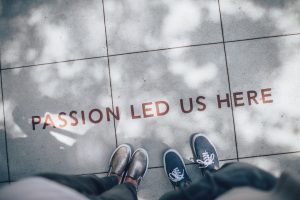 Passion led us here on sidewalk