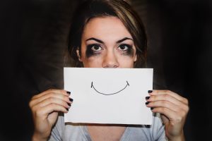 Human Giver Syndrome can feel like plastering on a smile