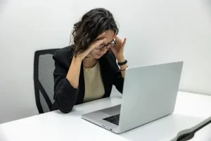 Burnout woman sitting at desk