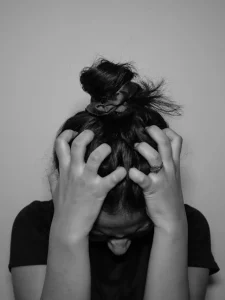 Woman feeling frustrated with her work because of burnout